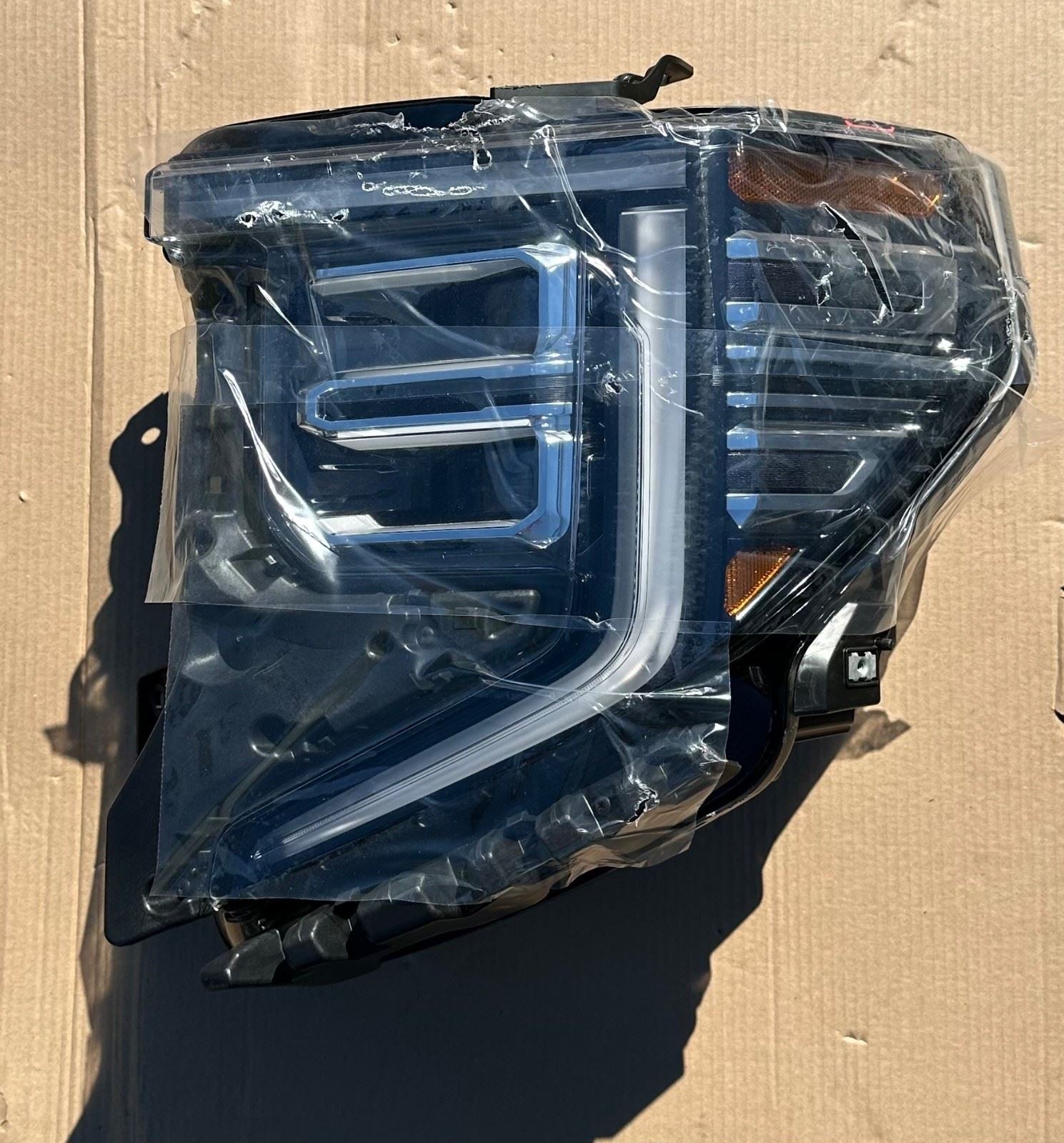 GM Front Headlamp Assembly 85064856 Driver Side - Minor Scratch - NOS