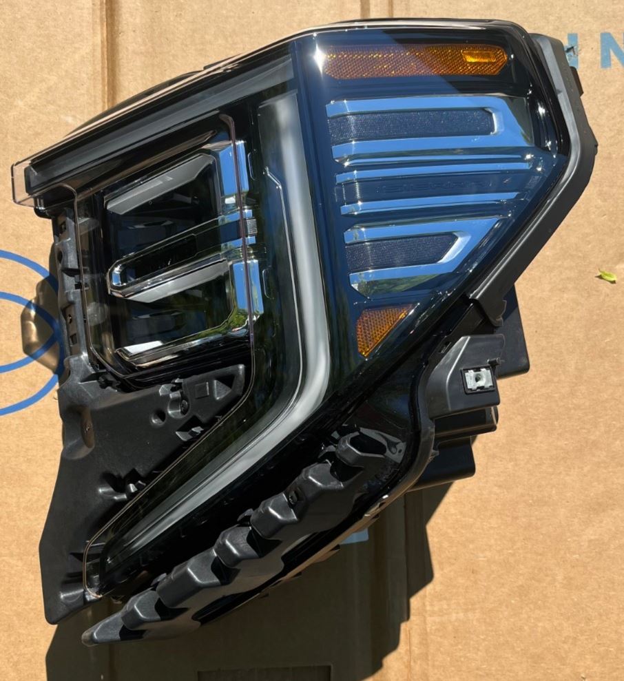 GM Front Headlamp Assembly 85064856 Driver Side - 1 brkn tab - NOS