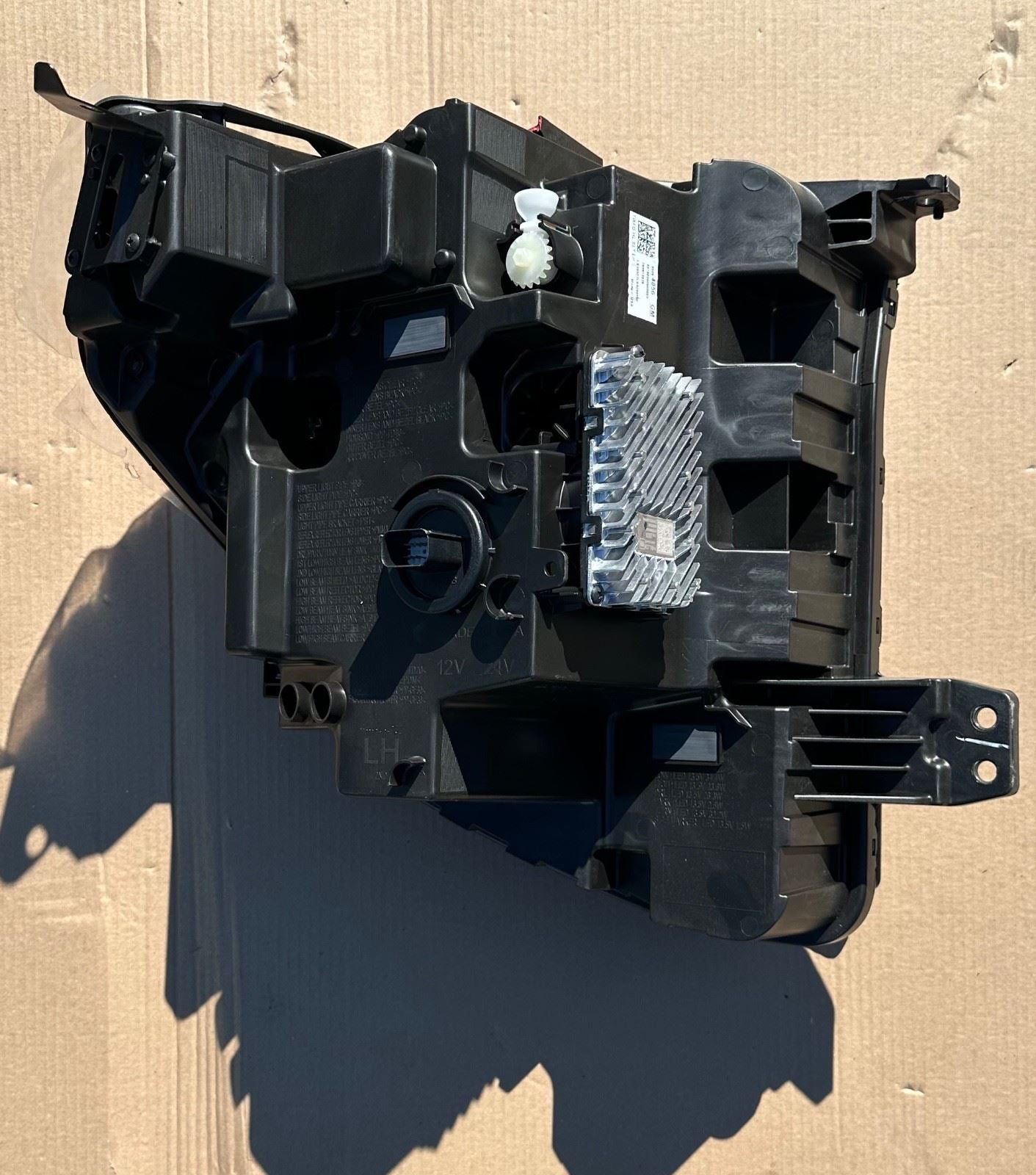 GM Front Headlamp Assembly 85064856 Driver Side - 1 Broken Tab - Nos