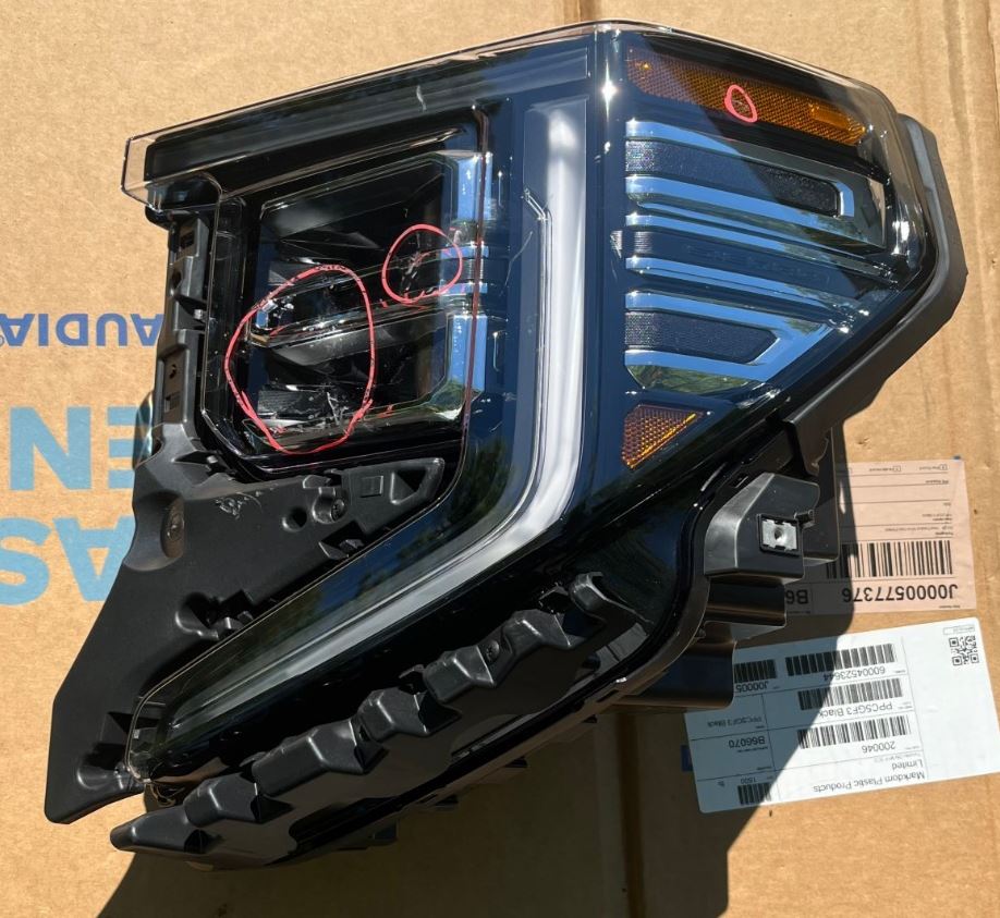 GM Front Headlamp Assembly 85064856 Driver Side - Scratches, 1 brkn tab - NOS